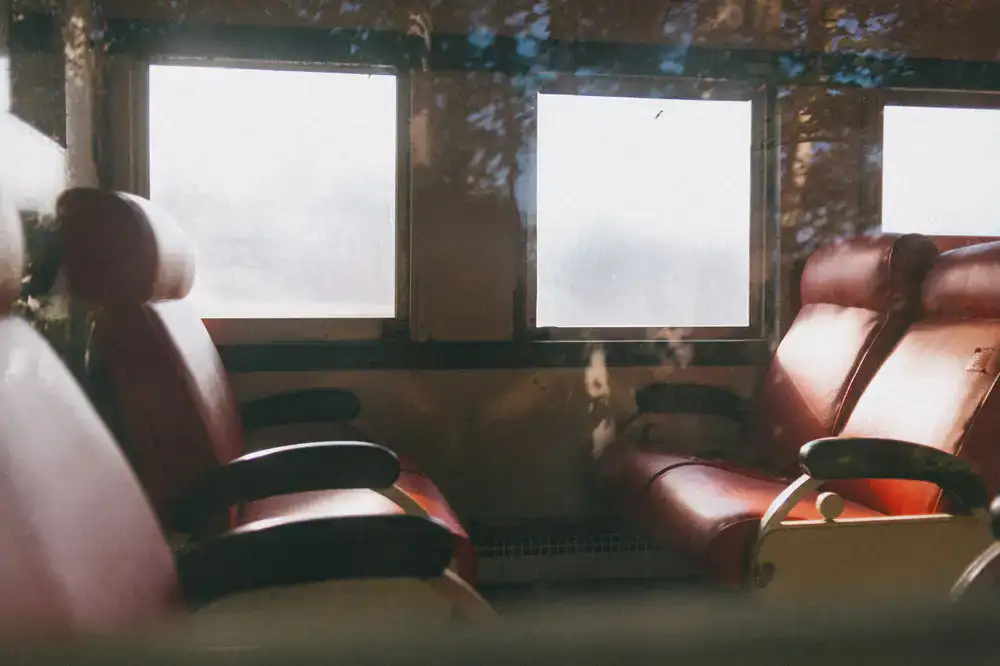 A vintage train ticket resting on a leather seat